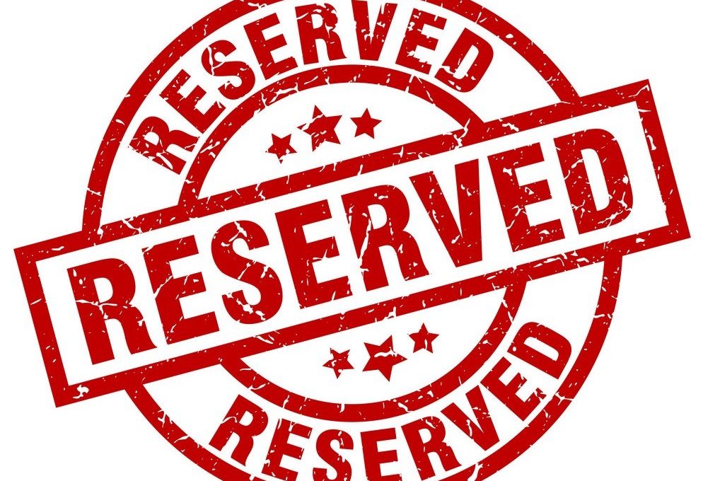 reserved round red grunge stamp